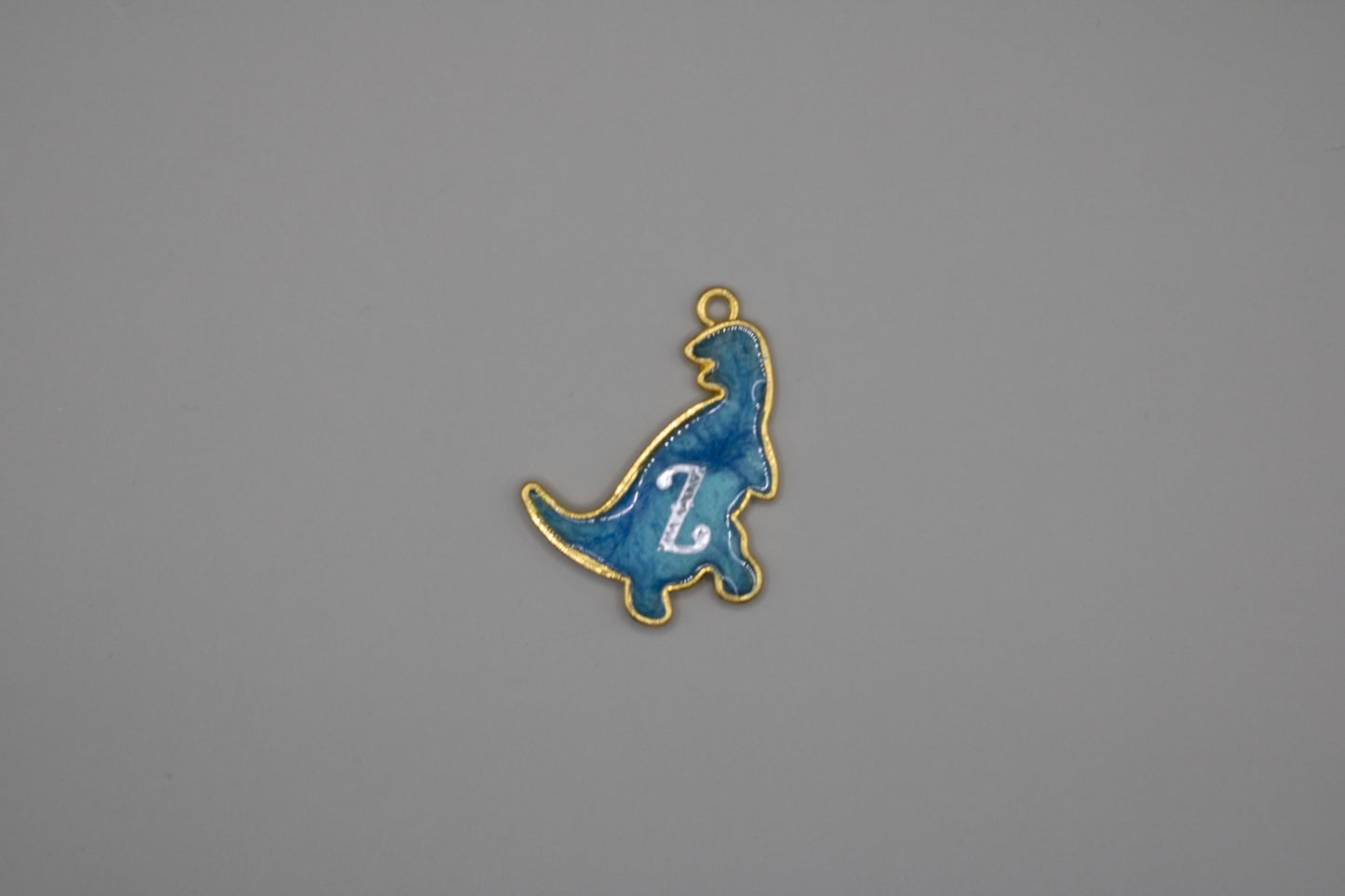 Resin pachycephalosaurus tag